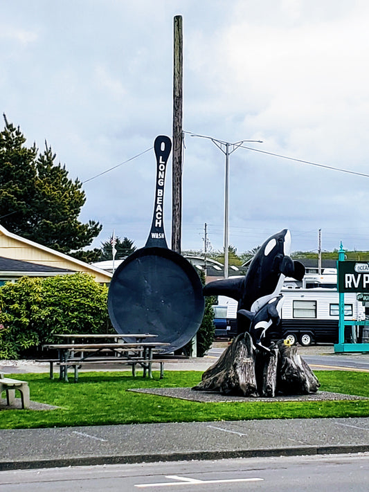 Large Frying Pan that says Long Beach and Orca statue