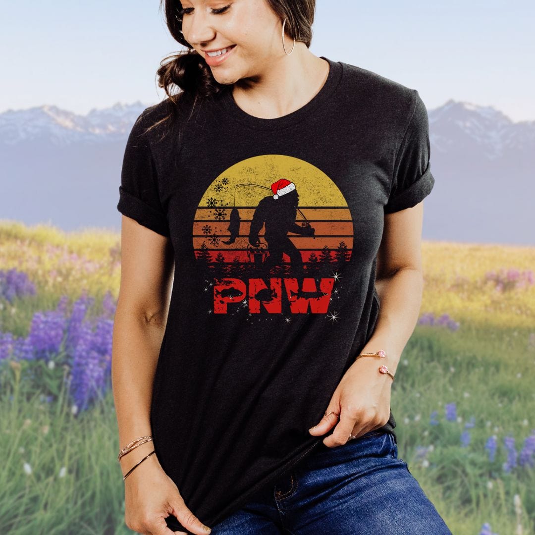 PNW Christmas Bigfoot Fishing Softstyle Tee