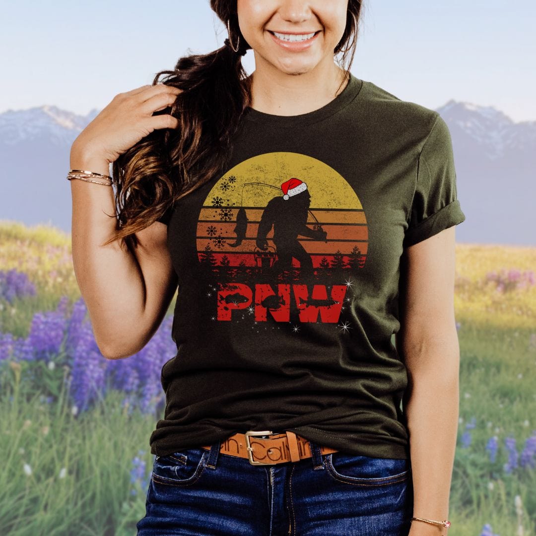 PNW Christmas Bigfoot Fishing Softstyle Tee