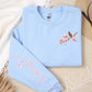 Floral Bird, Pocket and Sleeve Design, Softstyle Sweatshirt